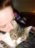 Rita kissing Mr. Gray
